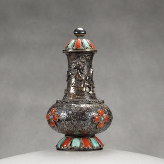 M2 A Manchu “Dragon” silver snuff bottle
