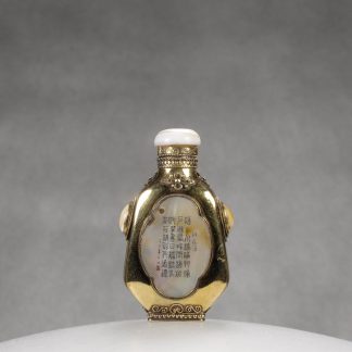 M8 A gold-plated silver “Earthly Paradise” snuff bottle