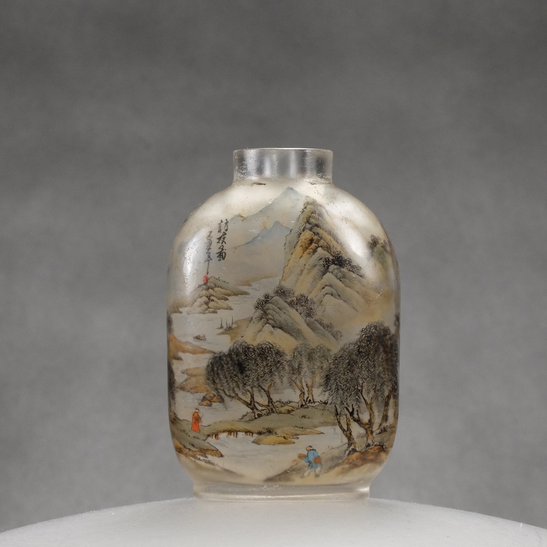 IP5 An inside painted glass snuff bottle “Lakes and mountains continuous scene”