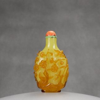 G19 An amber color overlay yellow glass "Three Friends of Winter" Imperial snuff bottle