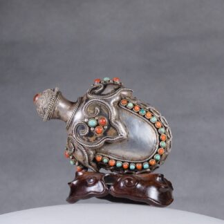 M5 A Mongol silver “Cash” snuff bottle